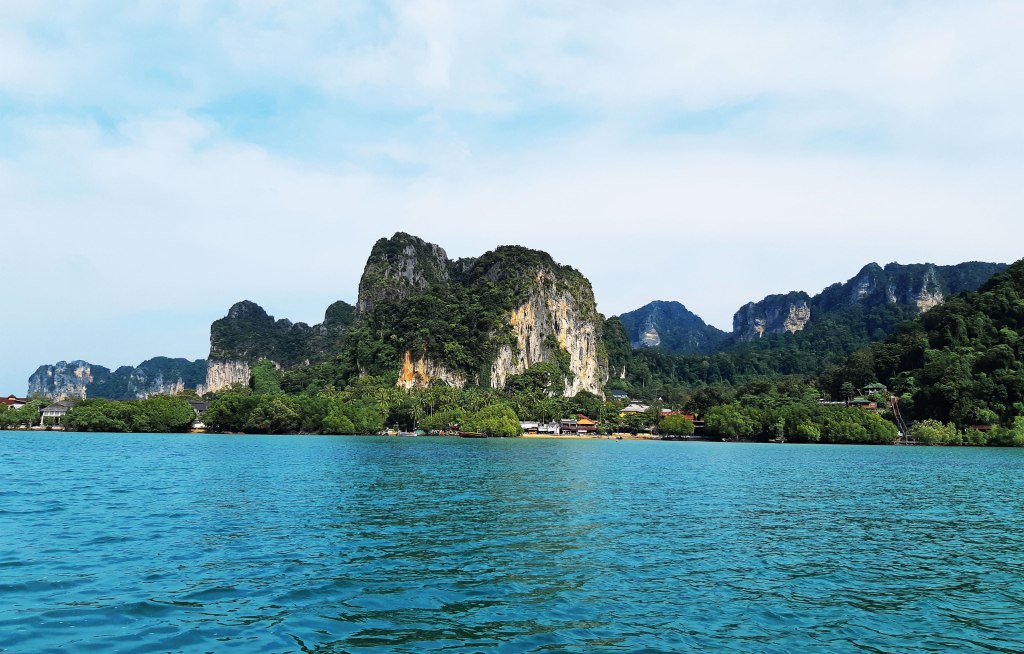 View of limestone cliffs on the way to the resort, Krabi, Thailand.