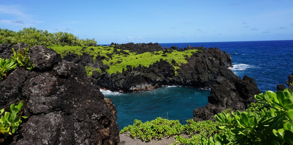 Cliffs by Honokalani Beach on the drive to Hāna, Maui, Hawaii.